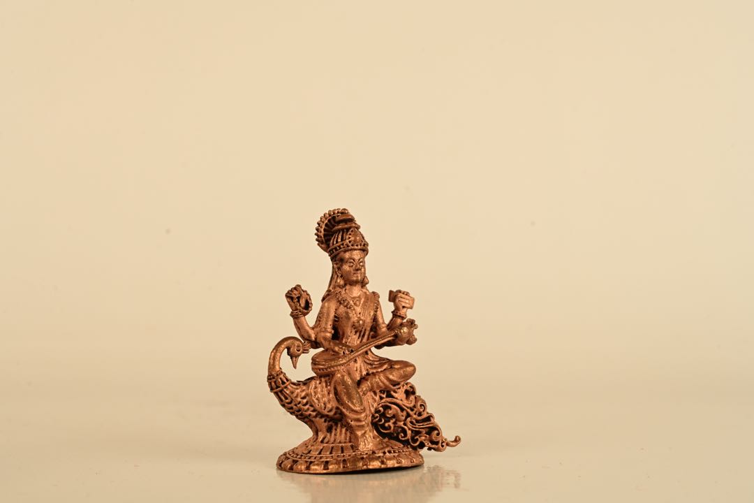 Goddess Saraswathi With Peacock Idol